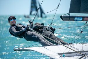 Georgia Lewin-France smiling for camera while sailing